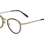 Brown round-frame eyeglasses with gold-tone metal temples and clear nose pads (Jaguar brand).