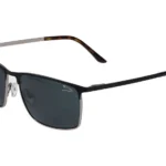 Black metal-frame sunglasses with dark lenses and tortoiseshell temples, Jaguar branding on the lens surface.