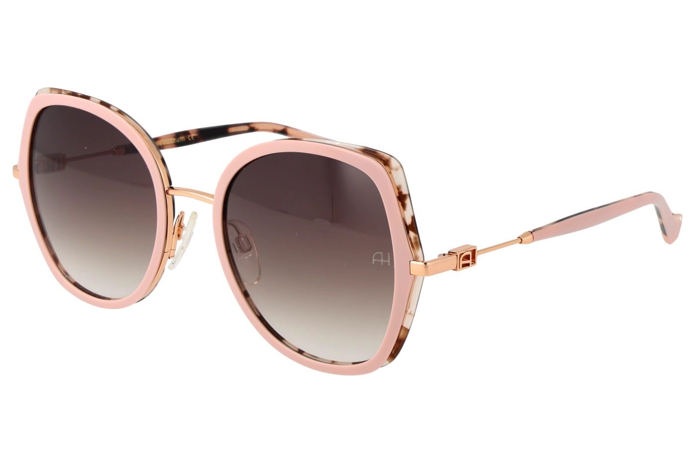 Pink-framed sunglasses with tortoiseshell accents and gradient lenses, metal nose bridge, and slim pink temples