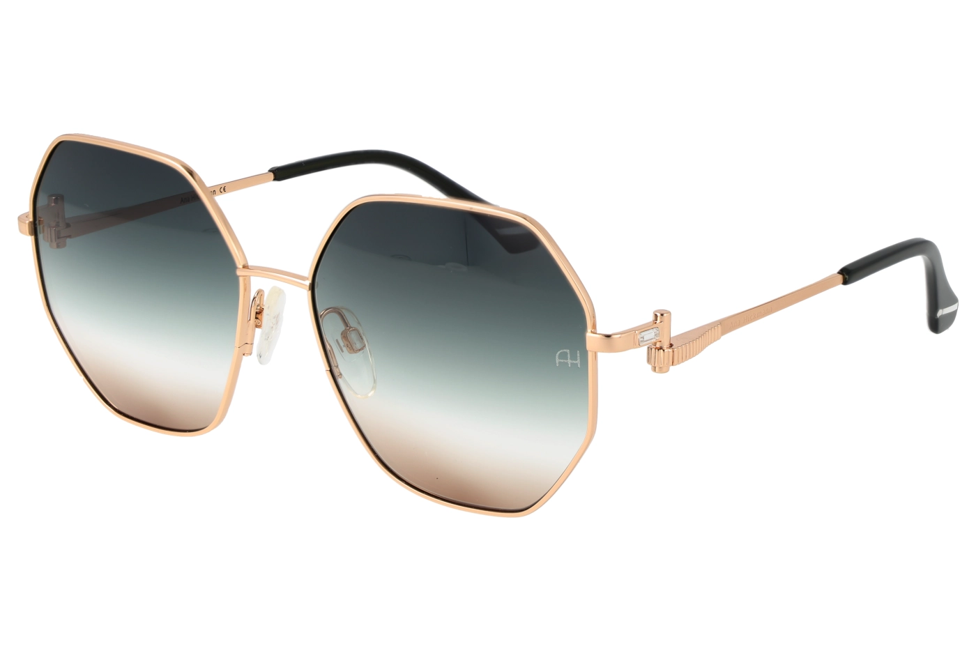 Rose-gold sunglasses with gradient lenses and black temple tips, angled to show frame detail.