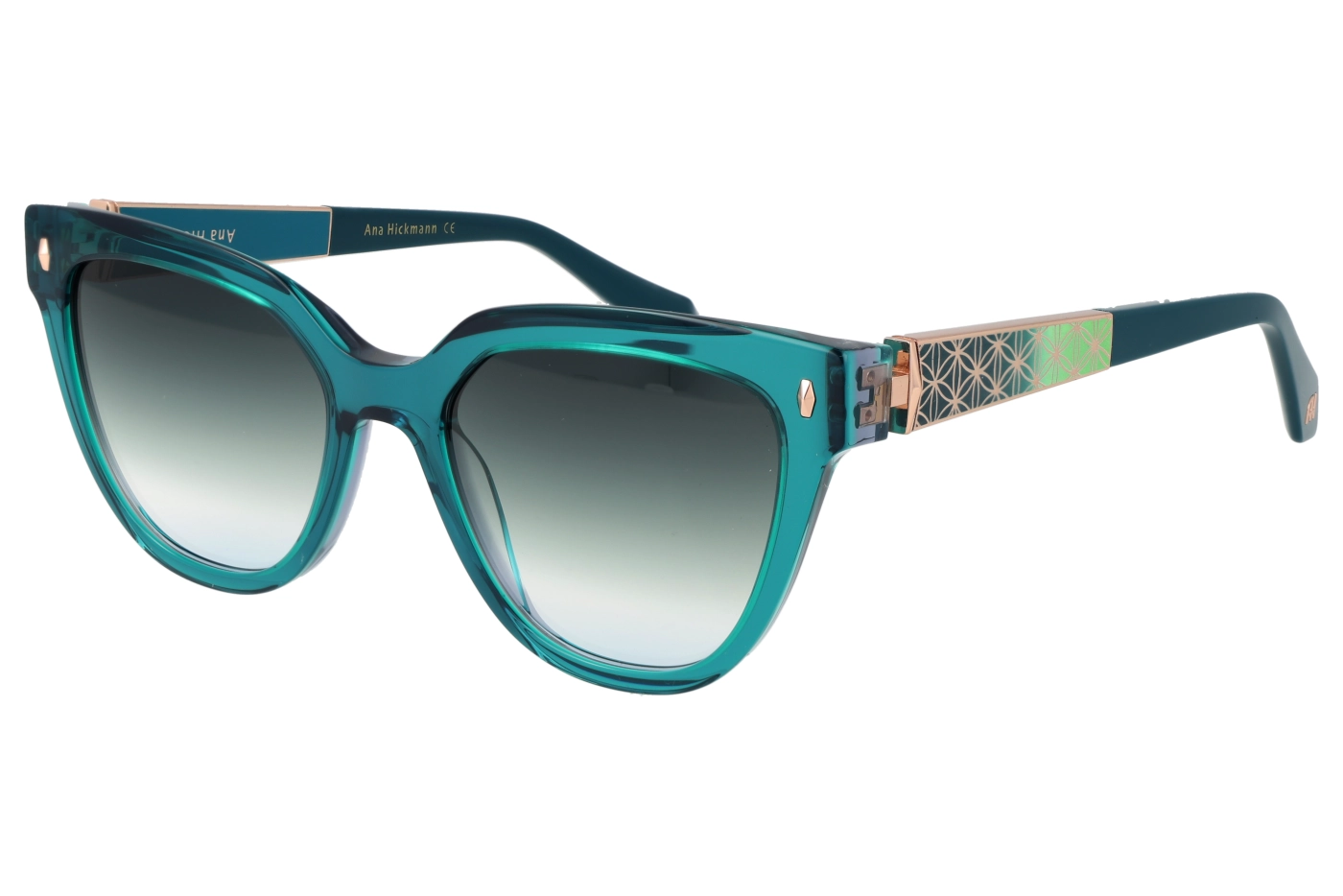 Teal oversized sunglasses with gradient lenses and gold patterned temples for a stylish, chunky frame look.
