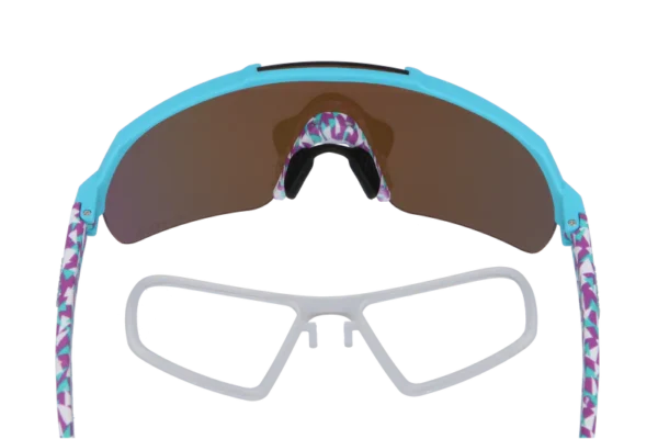 Turquoise sport goggles with brown mirrored lenses and a purple-patterned strap laid flat