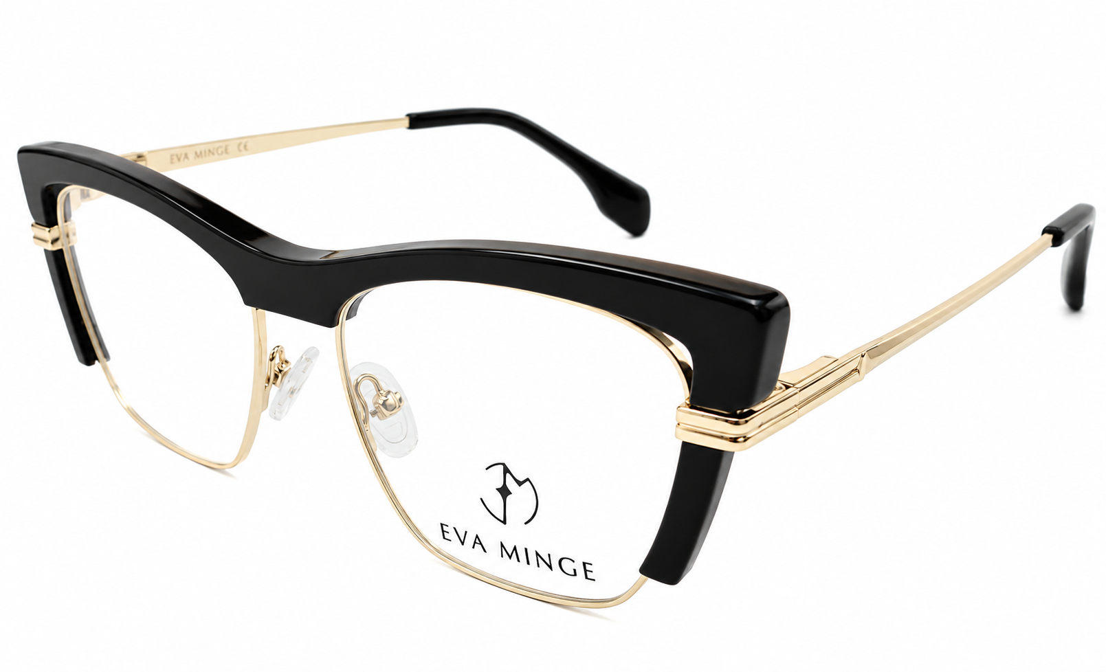 Gold and black designer eyeglasses with metal temples and clear nose pads, Eva Minge branding on the lens area.