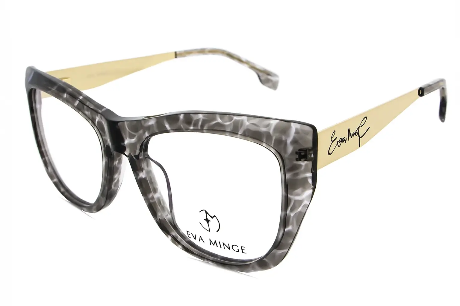Oversized tortoiseshell eyeglasses with thick frame and beige signature-etched temples (Eva Minge).