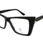 Black oversized, black frame glasses with white polka dots by Eva Minge.