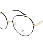 Gold-and-black Rimless eyeglasses with adjustable nose pads and thin temples, brand Eva Minge shown on lens