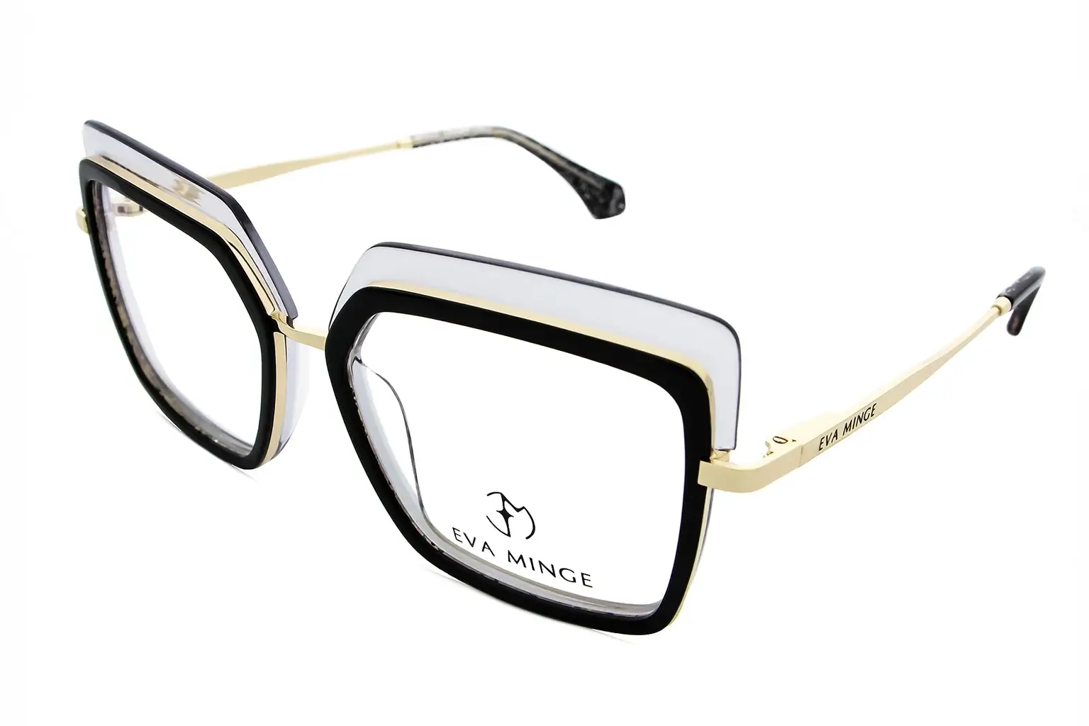 Oversized square eyeglasses with black, clear, and gold frame accents; gold temples with Eva Minge branding visible.
